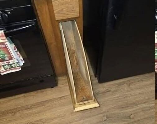 Found this cabinet door in our new house. What is this supposed to be used for